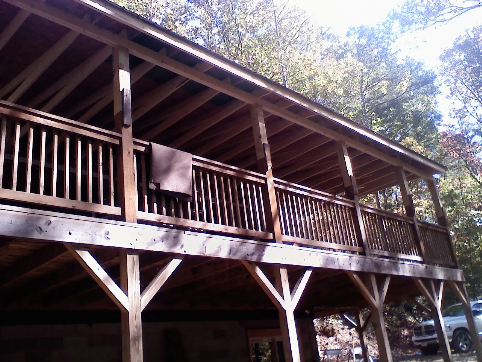 Timber framing under a new elevated porch and deck — Roof Leak Repair in Gay by Roofing Brothers